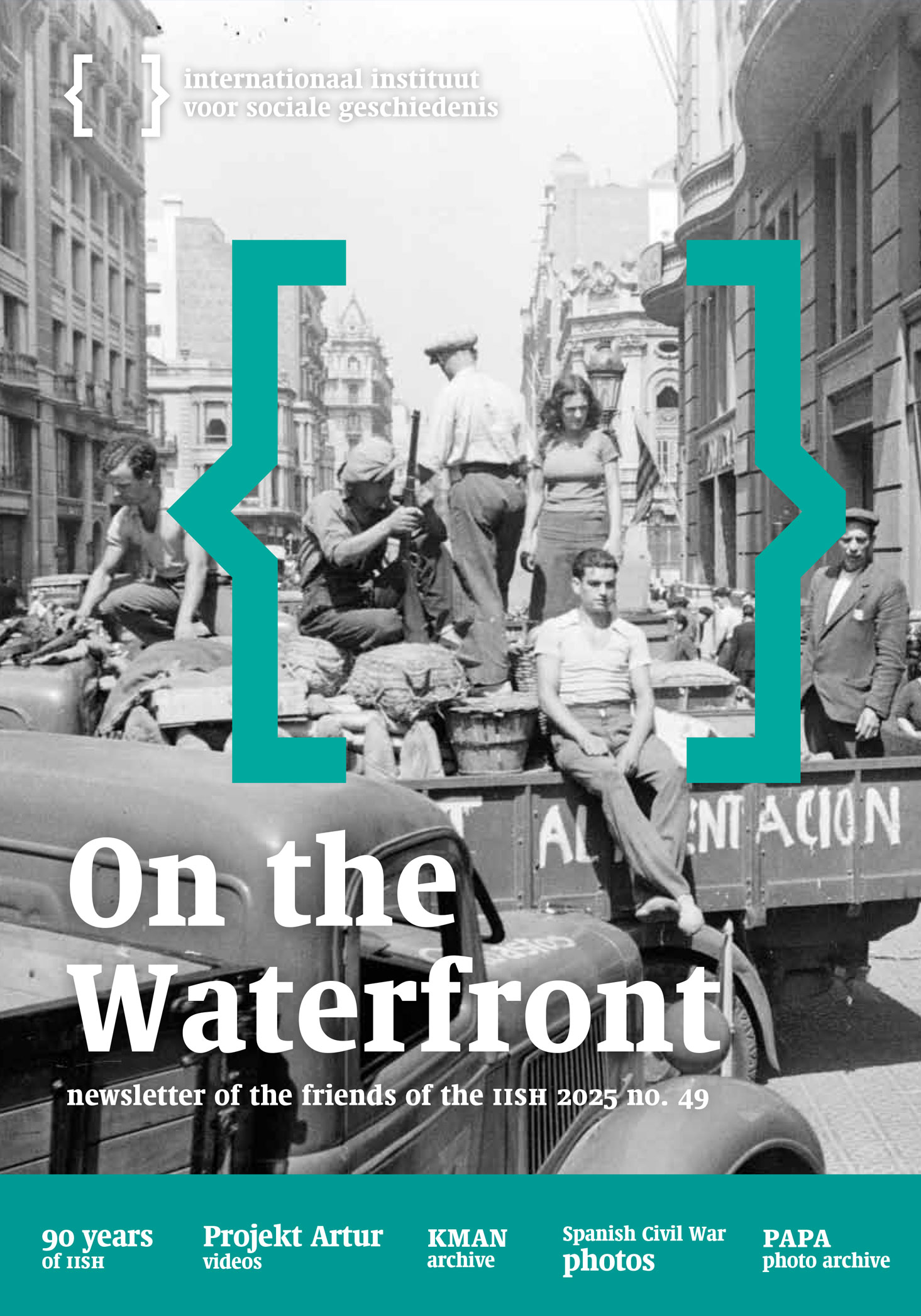 Cover of On the Waterfront 49.A black-and-white historical photograph shows men and women standing and sitting on a truck in a busy Spanish city street.