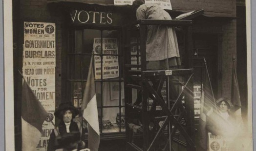 Pankhurst painting at the newly opened suffragette headquarters in Bow.